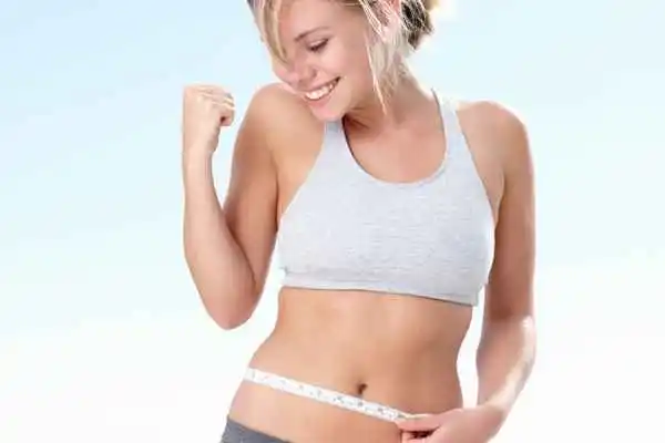 woman happy after fat reduction treatment Birmingham