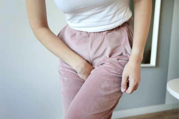 woman struggling with urine incontinence Birmingham
