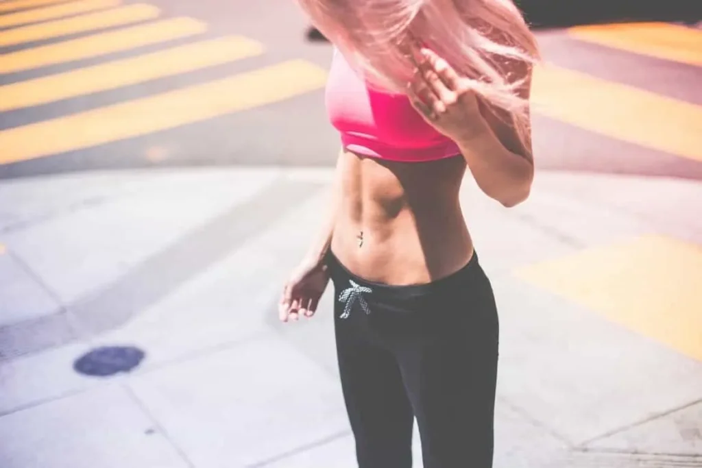 Woman with toned stomach after LA-EMS Body Sculpting Treatment Birmingham